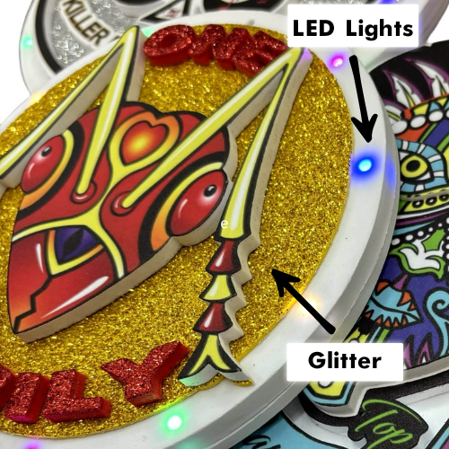 Colorful decorative fain chain with LED lights and glitter.